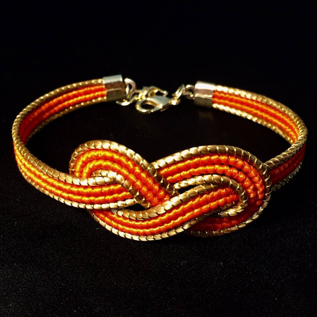 Bracelet Symbole de l'Infini en Or Végétal avec Fibre de Palmier Buriti Teintée Orange